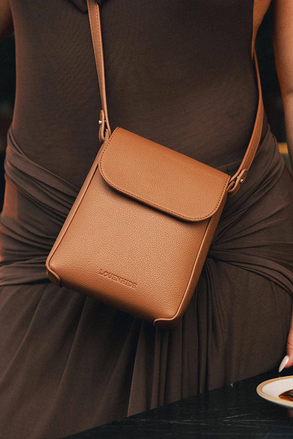 Product shot of the Bessie Crossbody Phone Bag - Toffee in colour Toffee, from the front