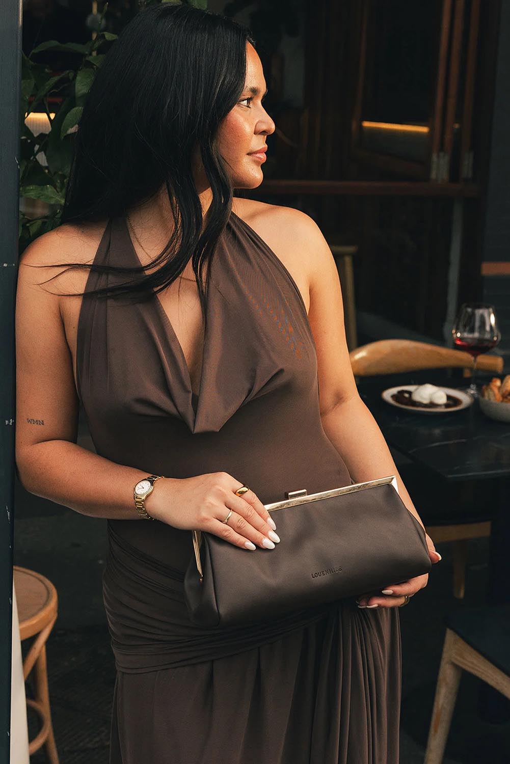 Product shot of the Maya Clutch - Chocolate in colour Chocolate, showing detail