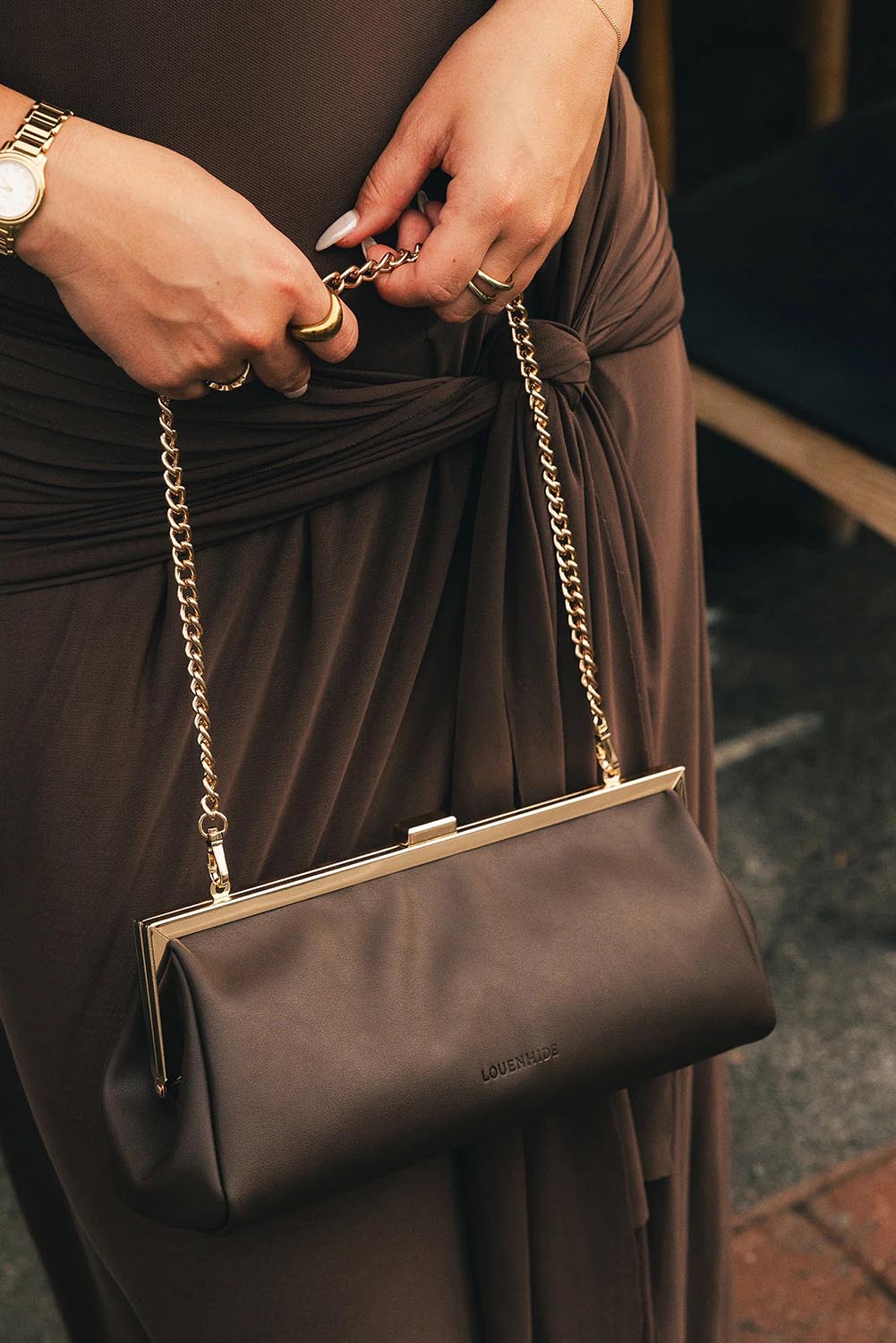 Product shot of the Maya Clutch - Chocolate in colour Chocolate, from the front