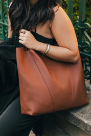Product shot of the Colby Tote Bag - Tan in colour Tan, from the back