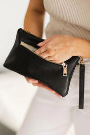 Product shot of the Mimi Clutch - Black in colour Black, from the back