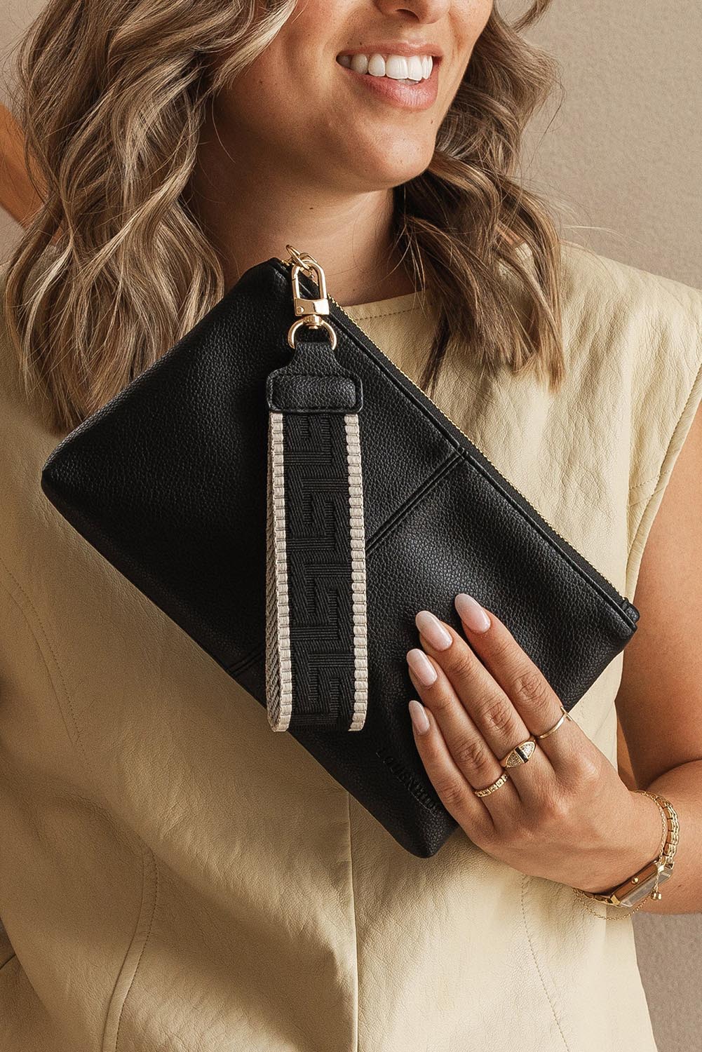 Product shot of the Mimi Clutch - Black in colour Black, from the front