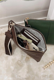 Product shot of the Mimi Clutch - Chocolate in colour Chocolate, from the back
