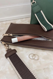 Product shot of the Mimi Clutch - Chocolate in colour Chocolate, from the front