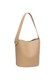 Product shot of the Miranda Bucket Bag - Camel in colour Camel, from the back