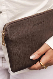 Product shot of the Poppy Clutch - Chocolate in colour Chocolate, from the back