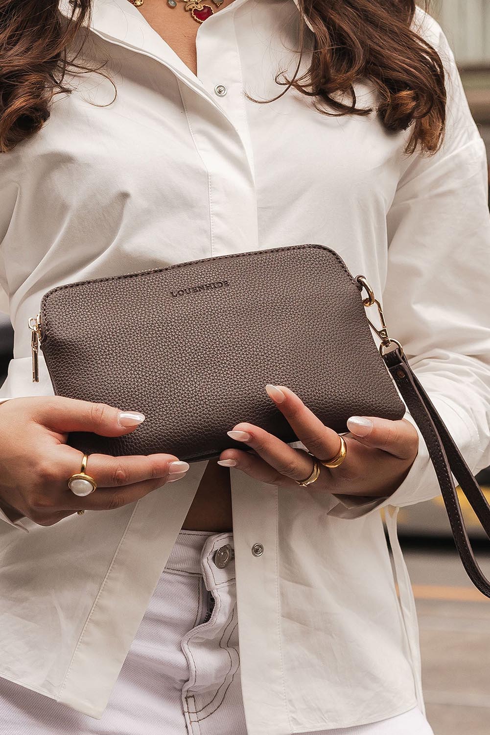 Product shot of the Poppy Clutch - Chocolate in colour Chocolate, from the front
