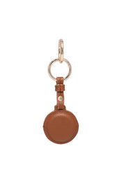 Product shot of the Opal Airtag Holder in colour Tan, from the back
