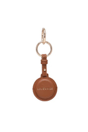 Product shot of the Opal Airtag Holder in colour Tan, from the front