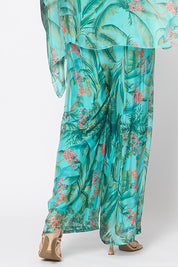 Model Genericm wearing size sample of the Silk Blend Printed Pant - Acquagarden in colour Acquagarden, from an angle