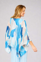 Model Genericm wearing size sample of the Silk Blend Printed Kaftan Top - Celesteabstract in colour Celesteabstract, from an angle