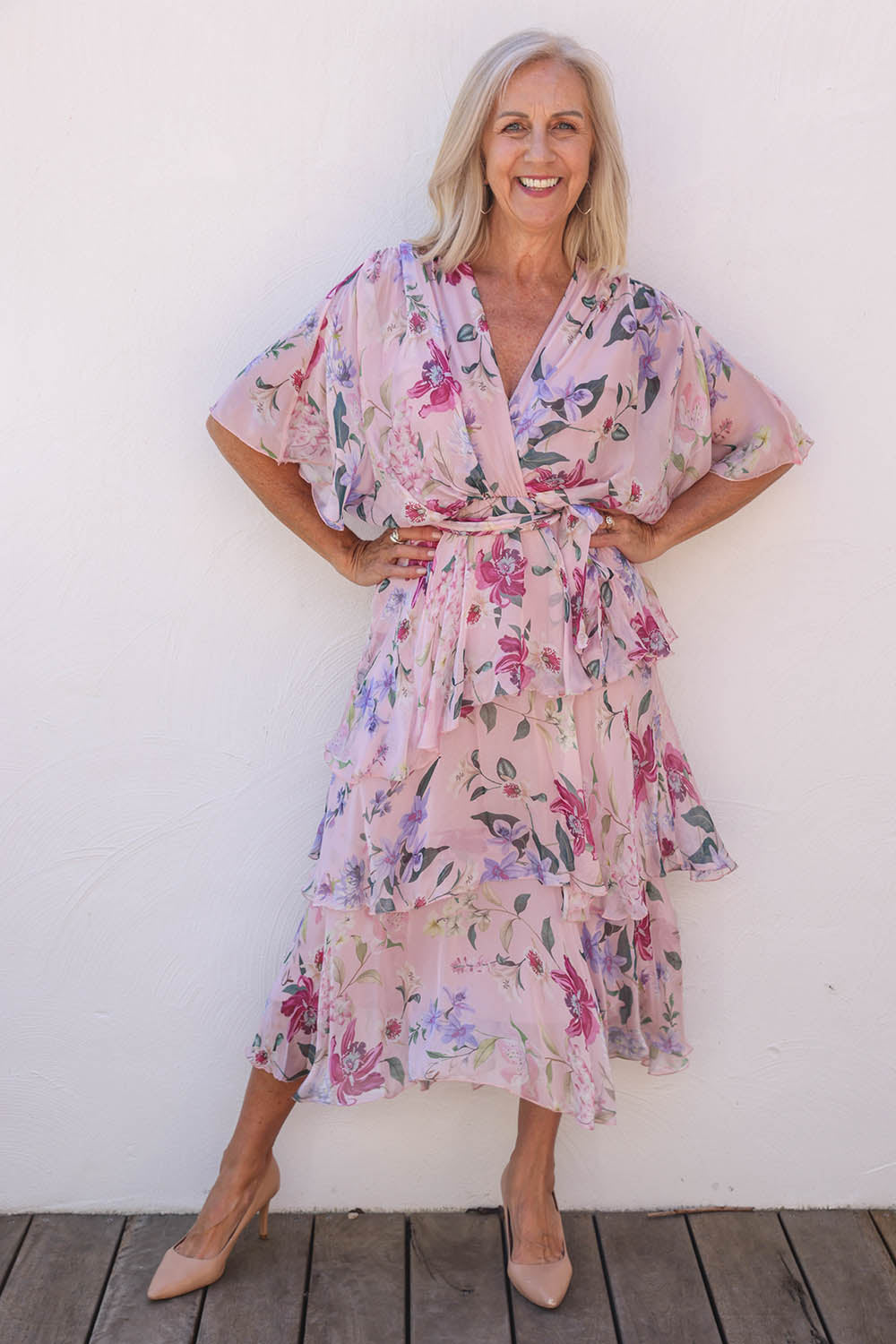 Model Sandy wearing the Short Sleeve Silk Blend Print Dress in colour Blushpink (Pink), from the front, showing the whole outfit