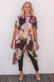 Model Sandy wearing the Silk Blend Overlay Top in colour Beigeprint, from the front, showing the whole outfit