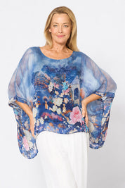Model Genericm wearing size sample of the Silk Blend Printed Kaftan Top - Navypinkfloral in colour Navypinkfloral, in a cropped view