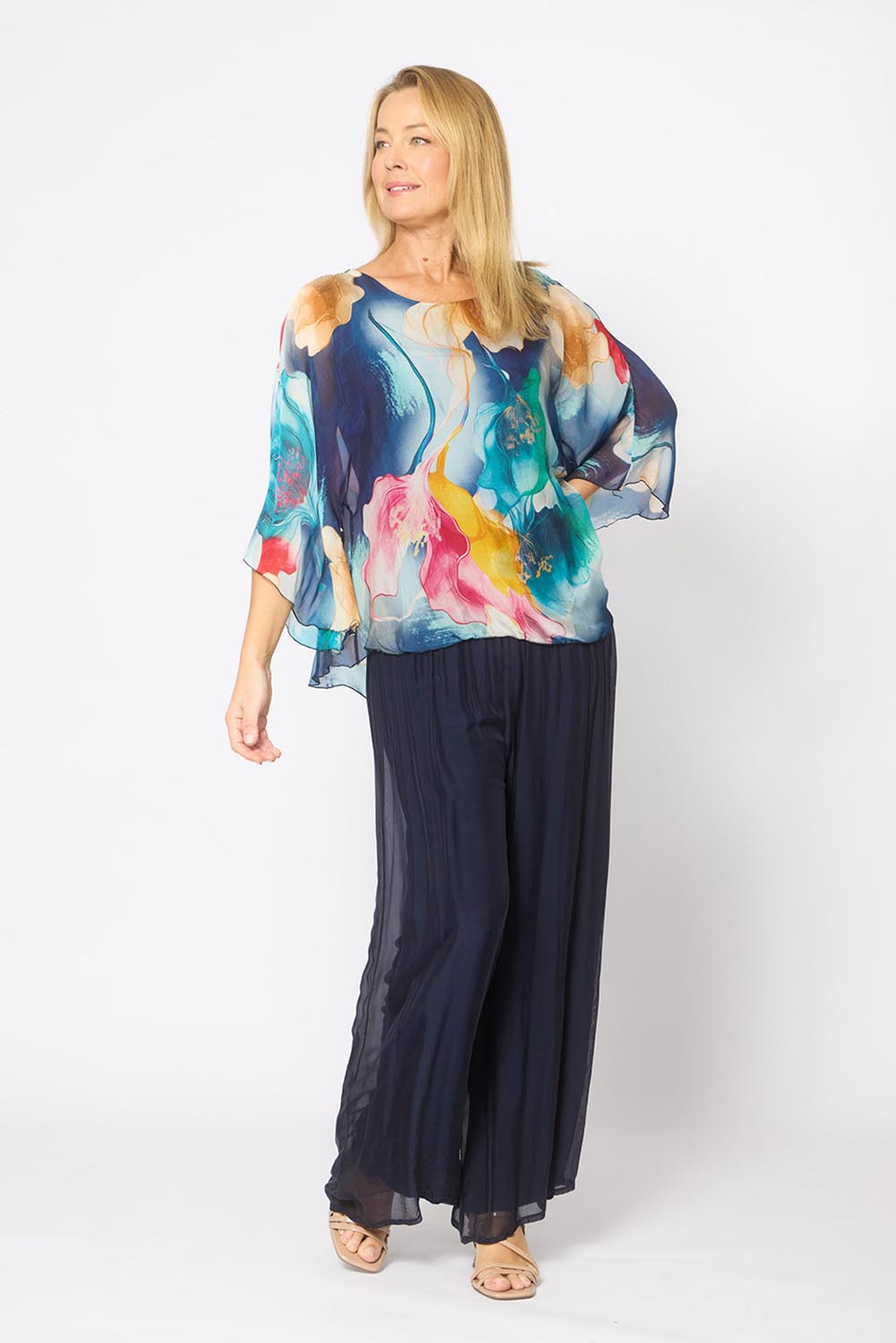 Model Genericm wearing size sample of the Silk Blend Flounce Sleeve Top - Navyfloral in colour Navyfloral, from the front
