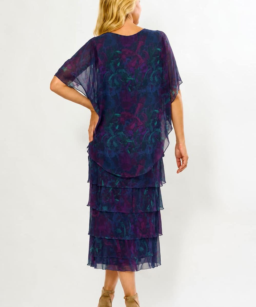 Model Genericm wearing size sample of the Silk Blend Multi Layers Dress - Navyfloral in colour Navyfloral, from the front