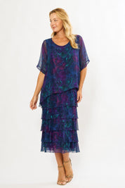 Model Genericm wearing size sample of the Silk Blend Multi Layers Dress - Navyfloral in colour Navyfloral, from the front