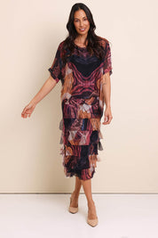 Model Amandam wearing size 10 of the Silk Blend Multi Layers Dress - Blackfloral in colour Blackfloral, from the front