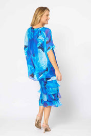 Model Genericm wearing size sample of the Silk Blend Multi Layers Dress - Cobaltprint in colour Cobaltprint, from the front