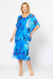 Model Genericm wearing size sample of the Silk Blend Multi Layers Dress - Cobaltprint in colour Cobaltprint, from the front