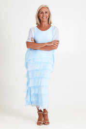 Model Sandy wearing the Silk Blend Multi Layers Dress in colour Celeste (Blue), from the front, showing the whole outfit