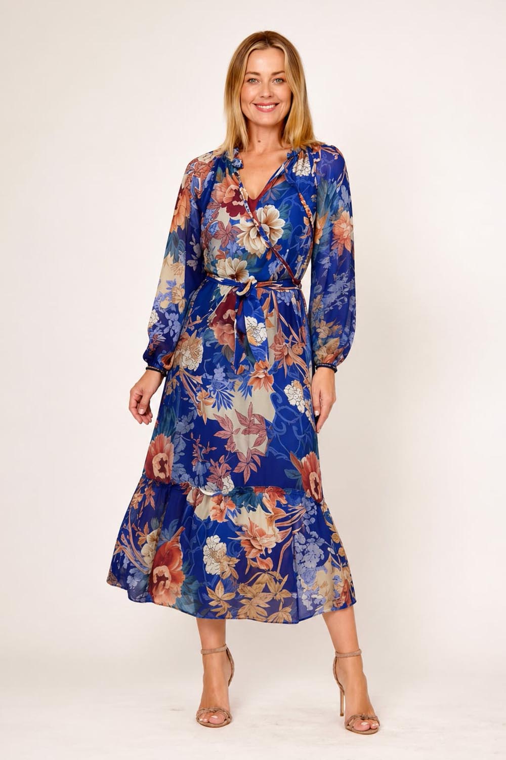 Model Genericm wearing size sample of the Silk Blend Frill Tied Neck Dress - Cobaltbluefloral in colour Cobaltbluefloral, from the front