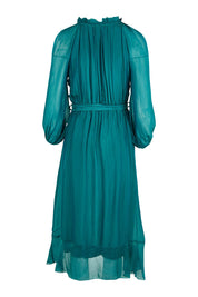 Product shot of the Frill Tie Neck Dress in colour Teal (Green), from the back