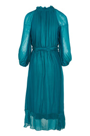 Product shot of the Long Sleeve Silk Frill Tied Neck Knee Length Dress in colour Teal (Green), from the back