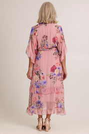 Model Sandy wearing size S of the Frill Sleeve Silk Blend Print Dress in colour Rosapink (Pink), from the back