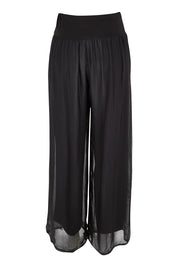 Product shot of the Silk Pant in colour Black (Black), from the back