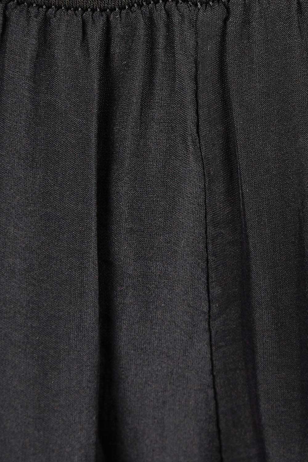 Product shot of the Silk Pant in colour Black (Black), detail