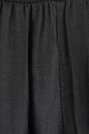Product shot of the Silk Pant in colour Black (Black), detail