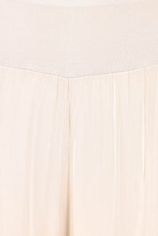 Product shot of the Silk Pant in colour Ivory, detail
