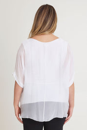 Model Chanel wearing the Silk Sequin Top in colour White (White), from the back