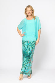 Model Genericm wearing size sample of the Silk Blend Three Layer Raw Edge Top - Acqua in colour Acqua, from the front