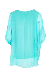 Product shot of the Silk Blend Three Layer Raw Edge Top - Acqua in colour Acqua, from the back