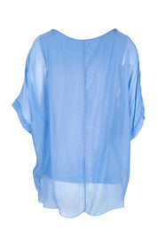 Product shot of the Silk Blend Three Layer Raw Edge Top in colour Blueturco (Blue), from the back