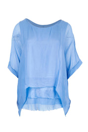 Product shot of the Silk Blend Three Layer Raw Edge Top in colour Blueturco (Blue), from the front