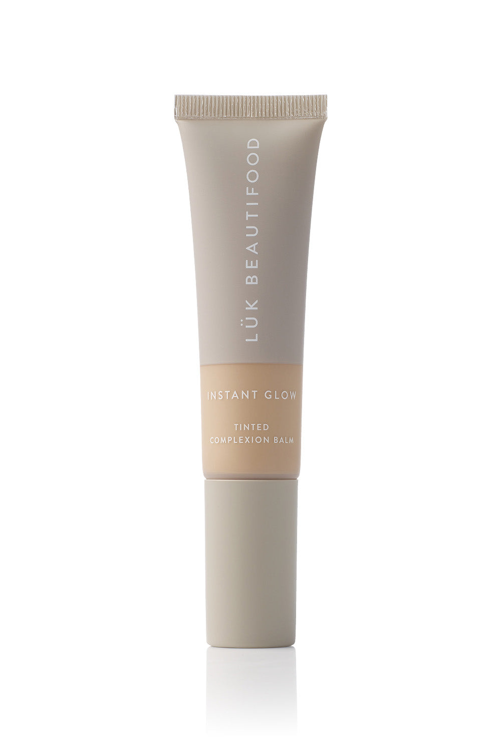 Product shot of the Tinted Complexion Balm in colour Medium, detail