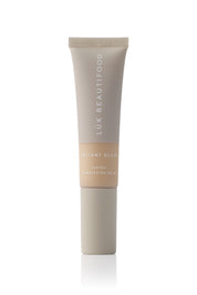 Product shot of the Tinted Complexion Balm in colour Medium, detail