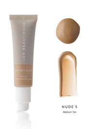Product shot of the Tinted Complexion Balm in colour Mediumtan, detail