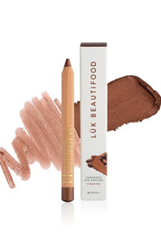 Product shot of the Luminous Eye Crayon - Cocoa in colour Cocoa, from the front