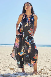 Model Eshan wearing size 10 of the Abyss Maxi Dress - Black in colour Black, from the front