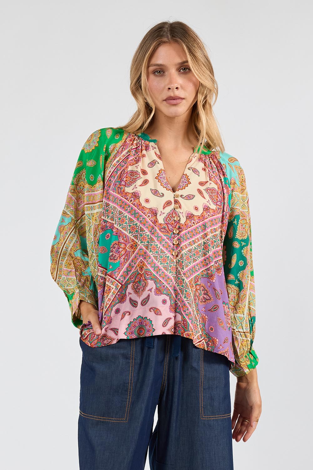 Model Genericm wearing size sample of the Algarve Top – Multi in colour Multi, from an angle