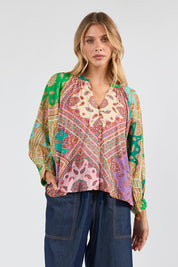 Model Genericm wearing size sample of the Algarve Top – Multi in colour Multi, from an angle