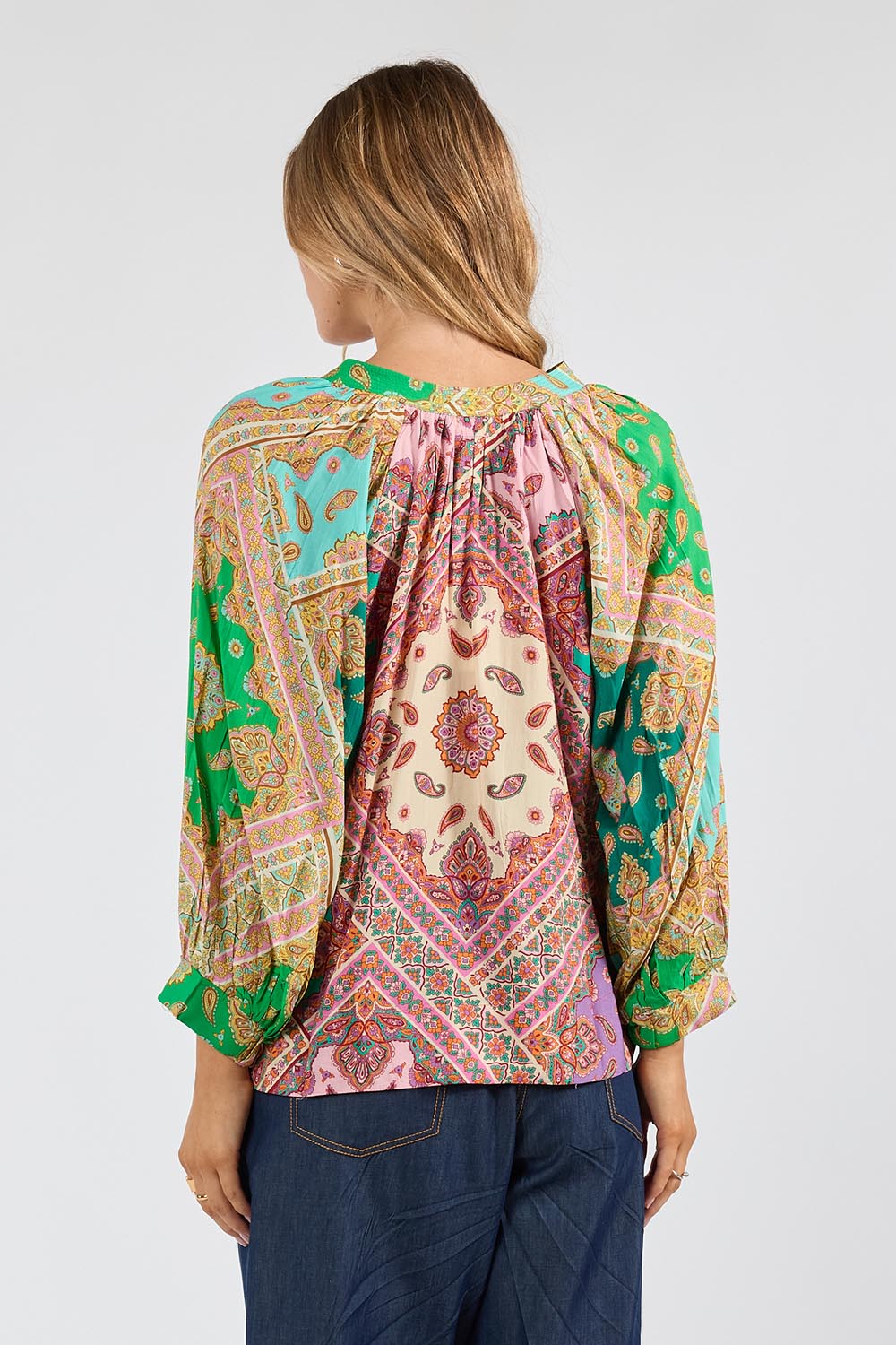 Model Genericm wearing size sample of the Algarve Top – Multi in colour Multi, from the back
