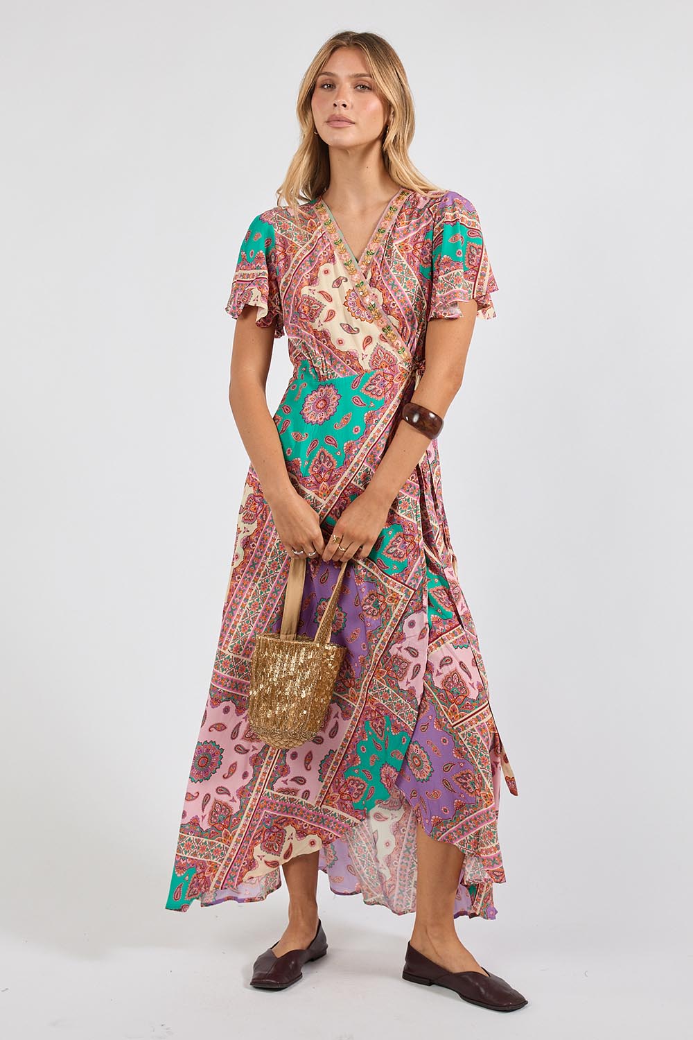 Model Genericm wearing size sample of the Algarve Wrap Dress – Violet in colour Violet, from the front