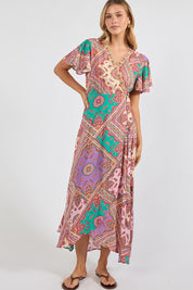 Model Genericm wearing size sample of the Algarve Wrap Dress – Violet in colour Violet, from the front