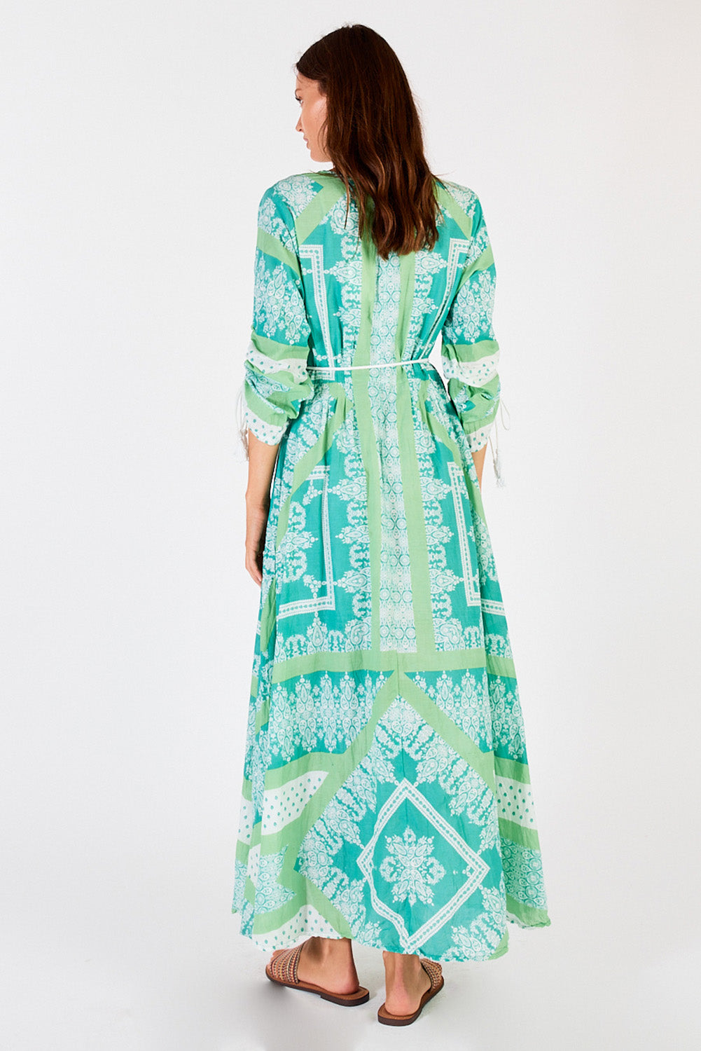 A model wearing the Bandana Cotton Maxi Dress in colour Sea (Green), from the back