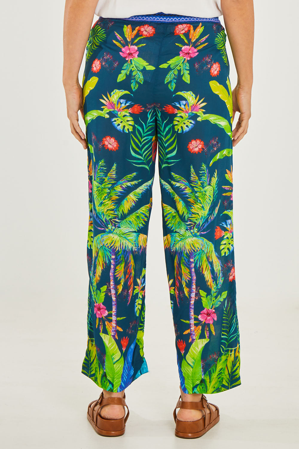 Model Georgia wearing size S of the Blair Pant in colour Navy (Blue), from the back